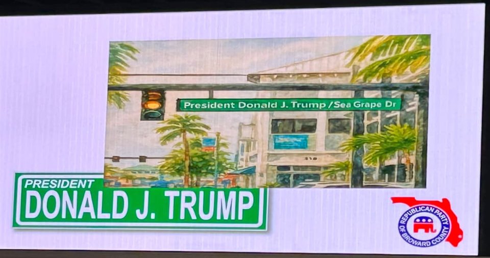 The Broward Republican Party's slide at its Reagan Day dinner, September 13, 2025: a President Donald J. Trump street sign, the Sea Grape Drive corner, and the party's logo