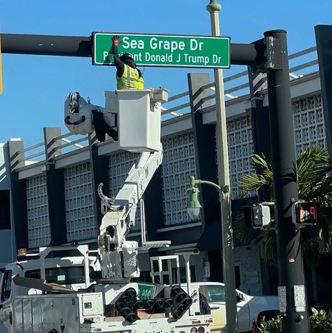 February 2026: the President Donald J Trump Dr sign being installed at Sea Grape Drive and Commercial Boulevard